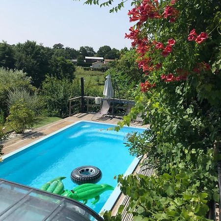 Le Petit Moulin Hotel ปูโซจส์ ภายนอก รูปภาพ